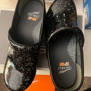 Dansko Rainbow Speckle Clogs